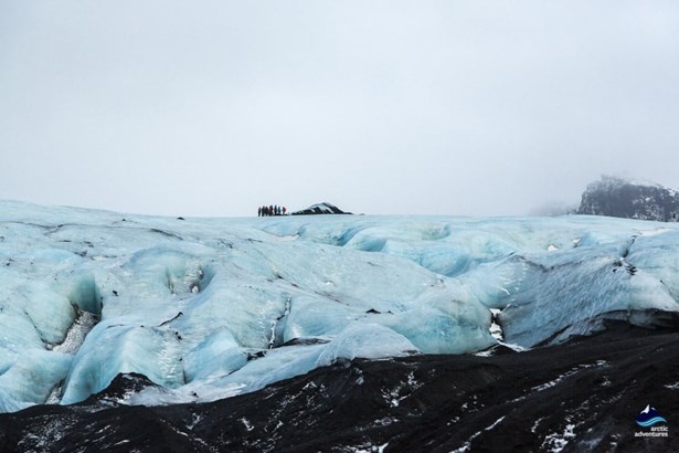 group walking on Solheimajokull glacier in Iceland