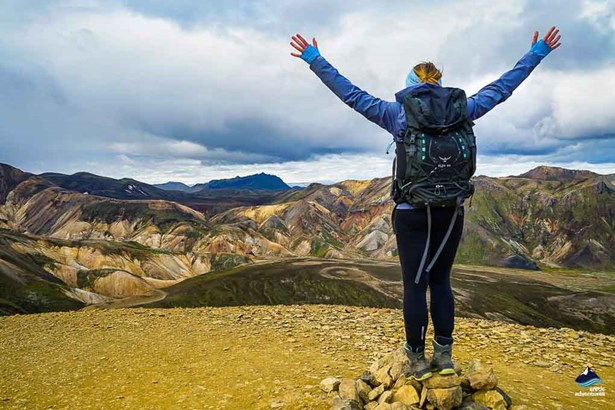 excited hiker posing for picture in landmannalaugar