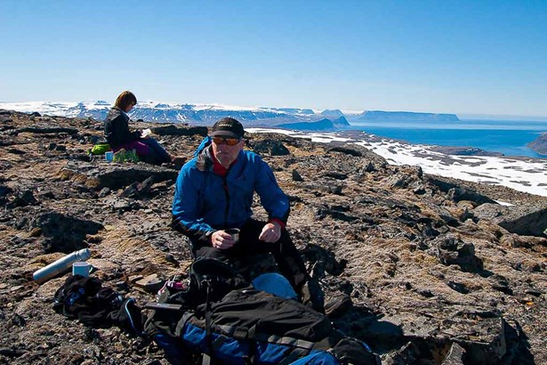 hikers having picnic on the mountain in Iceland