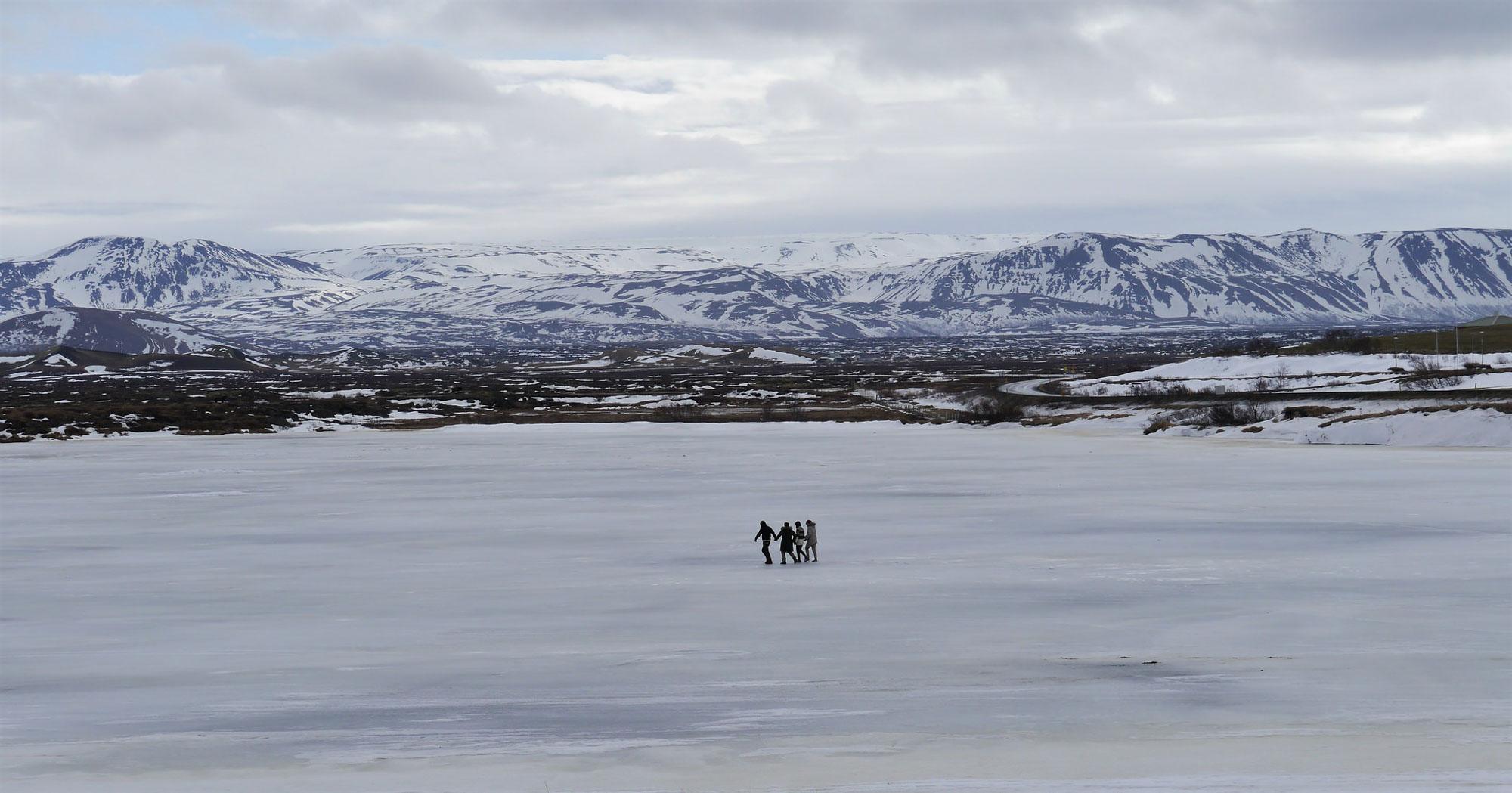 People Walking on Frozen Myvatn Lake