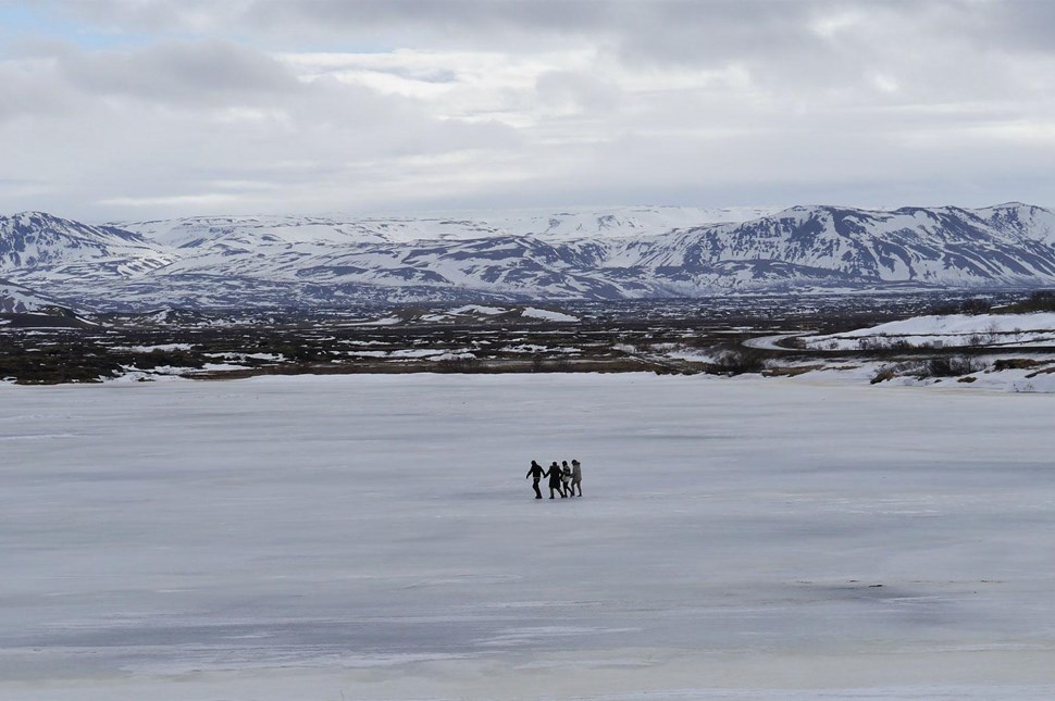 People Walking on Frozen Myvatn Lake