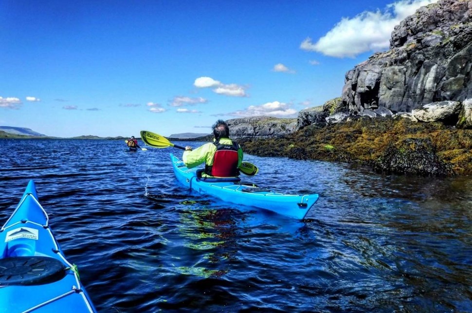 Man kayaking in Iceland