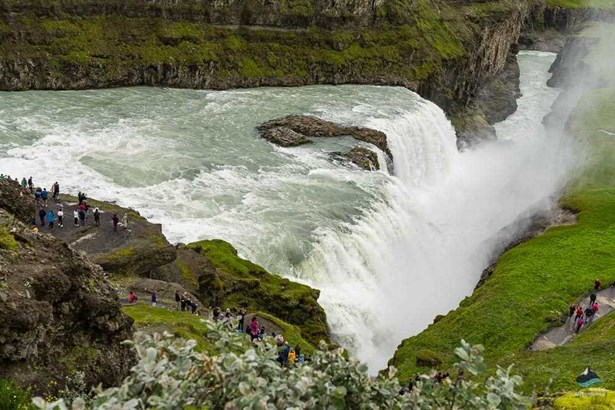 tourists around Gullfoss waterfall in Iceland