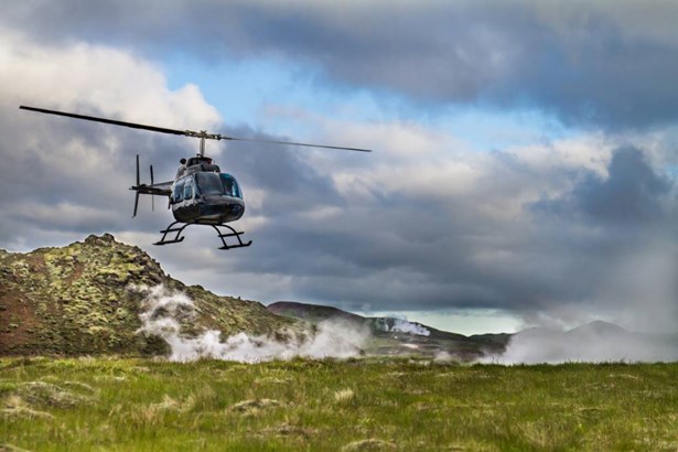 helicopter flying in Icelandic geothermal fields