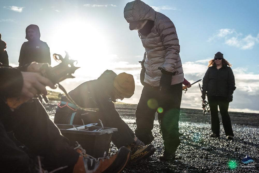 people getting ready for Solheimajokull glacier hike