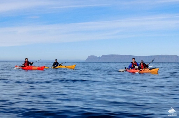 small group kayaking tour in the sea