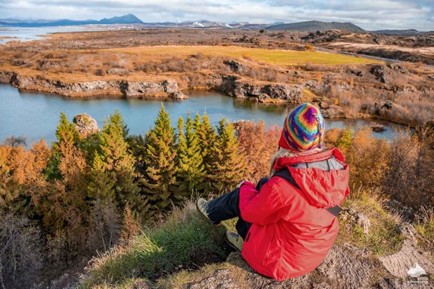 woman enjoys view of Icelandic nature