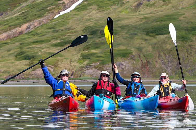 happy group pf kayakers happy group pf kayakers in Iceland