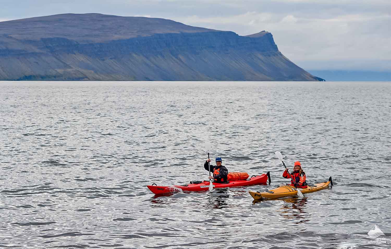  couple kayaking in Icelandic sea