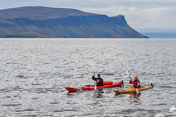  couple kayaking in Icelandic sea