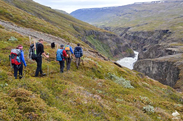 group of people hiking in Icelandic mountains