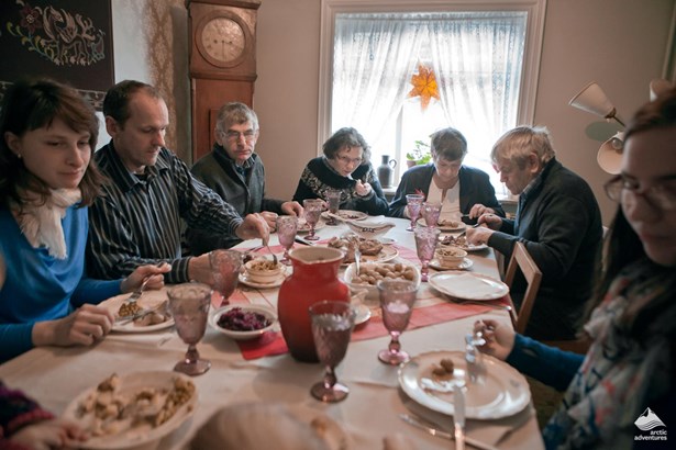 people eating traditional Icelandic festive dinner
