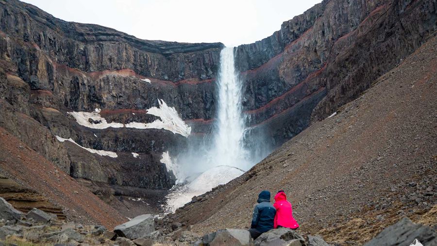 couple enjoys view of Waterfall