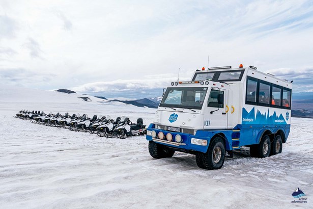Icelandic tour truck and snowmobiles