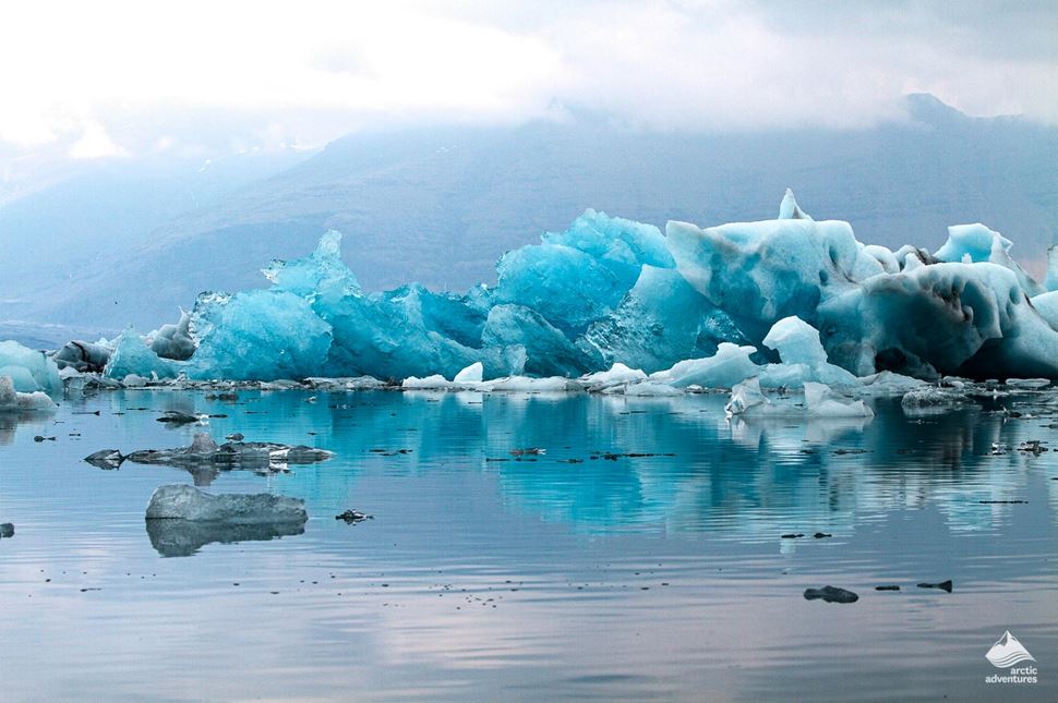 The black and blue icebergs at a glacier lagoon in Iceland