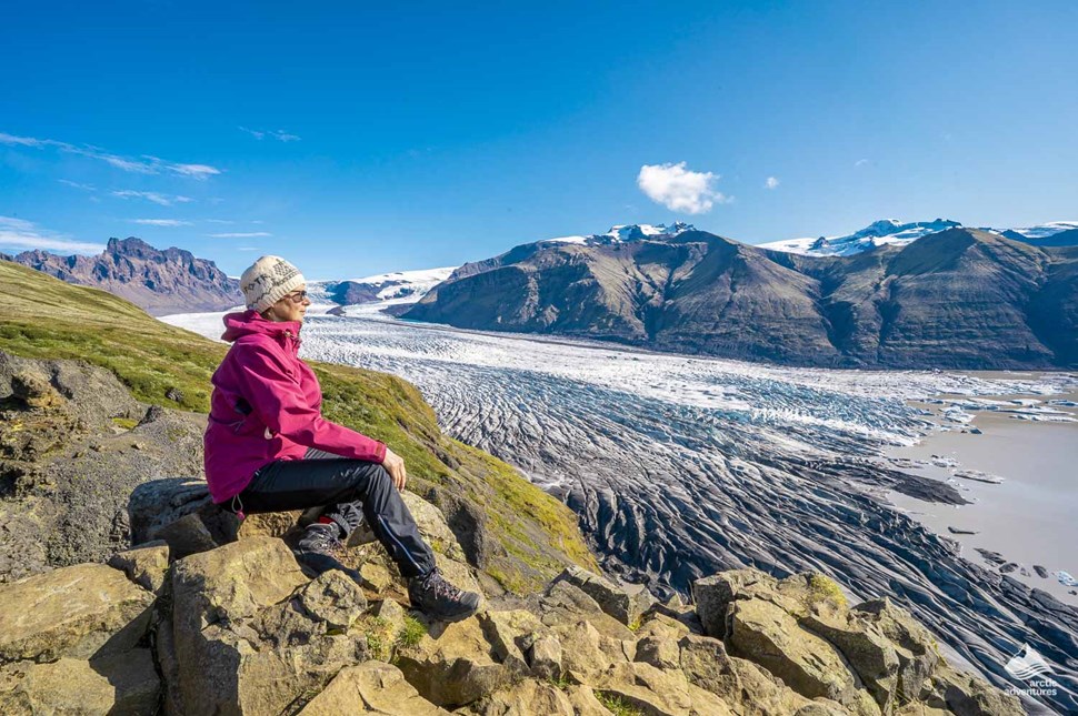 A hiker looking out at the glacier in Skaftafell National Park