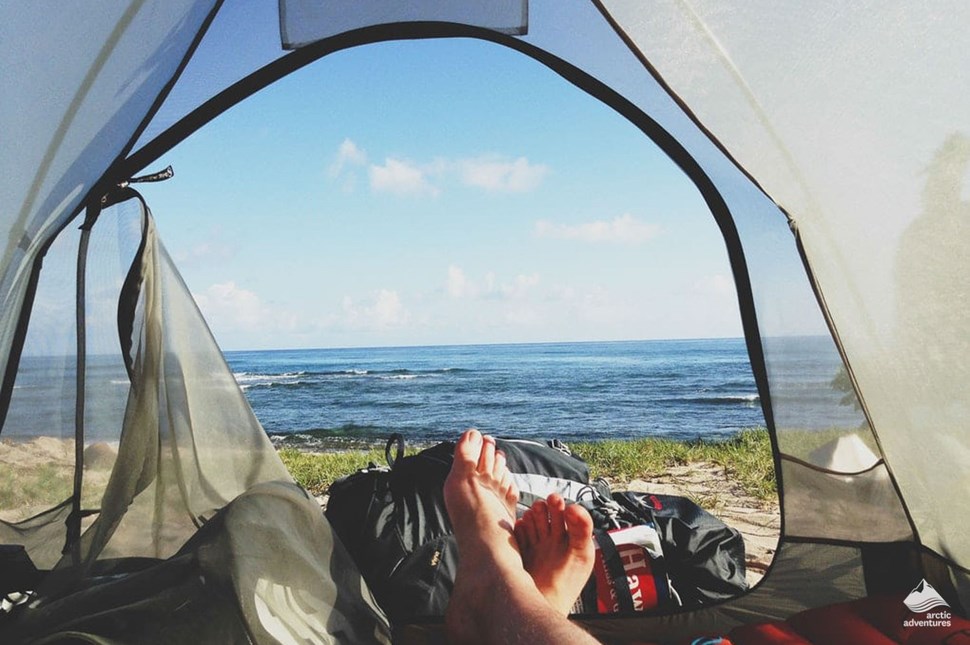 view from tent to the ocean in Iceland