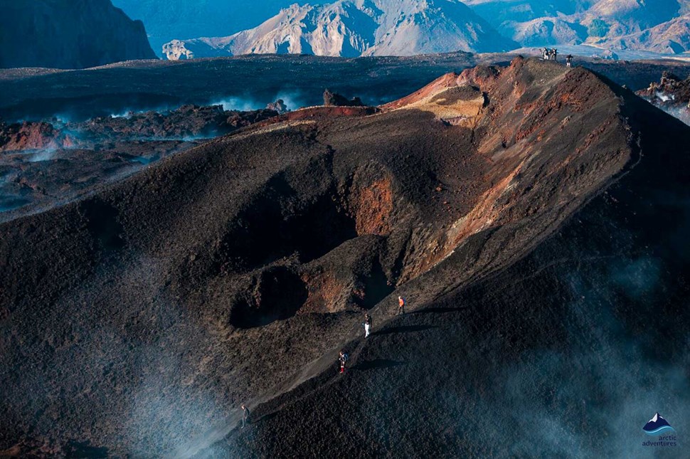 people hiking on Thorsmork volcano in Iceland