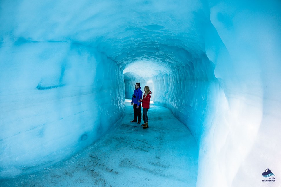 couple inside the ice cave in Iceland