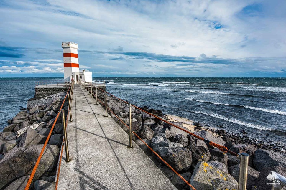 Gardskagi lighthouse by the ocean