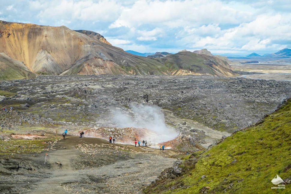 tourists at Landmannalaugar Steam Valley in Iceland