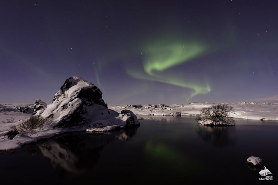 Northern Auroras over Myvatn lake in winter