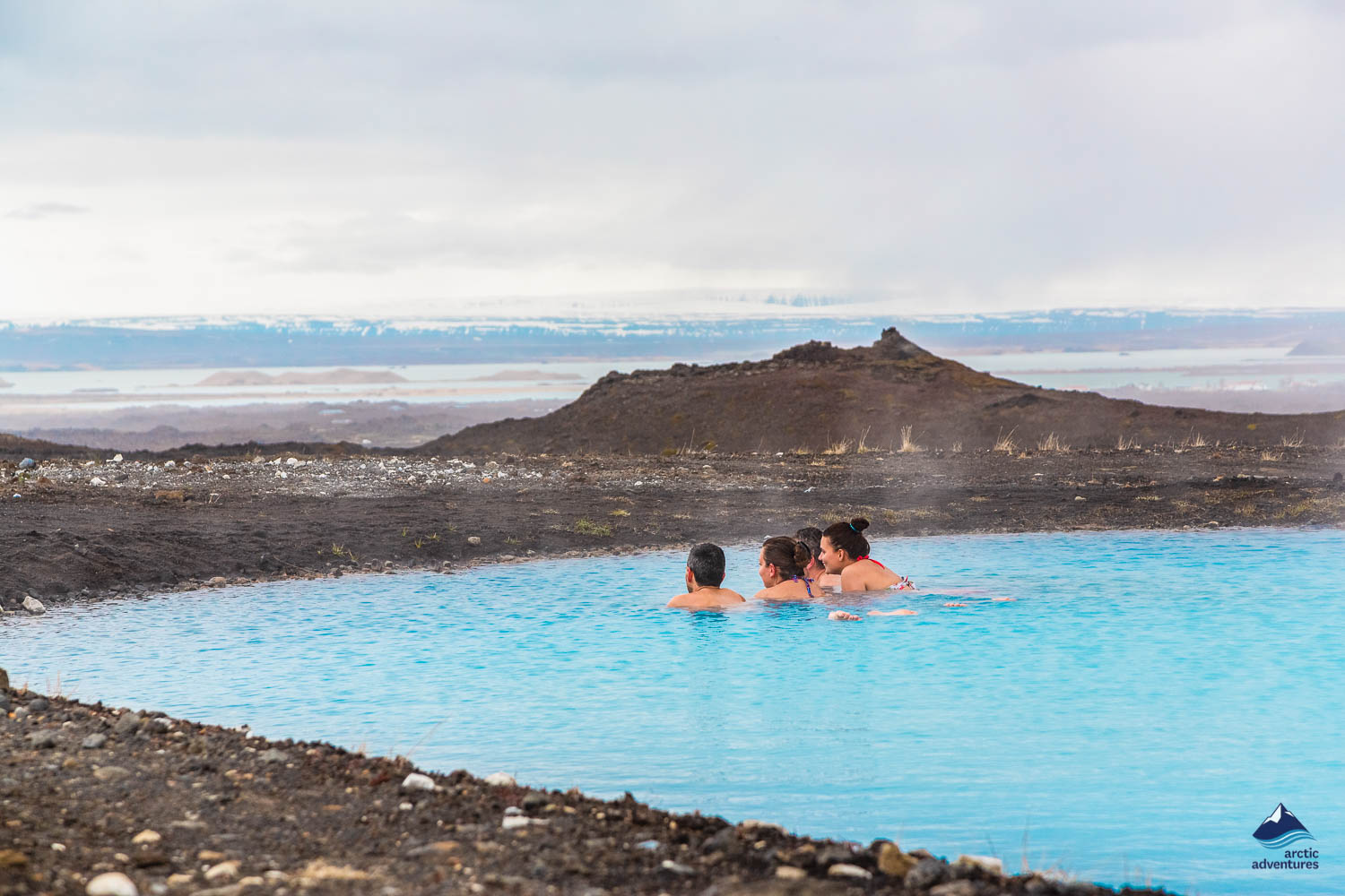 people bathing in nature baths of Myvatn