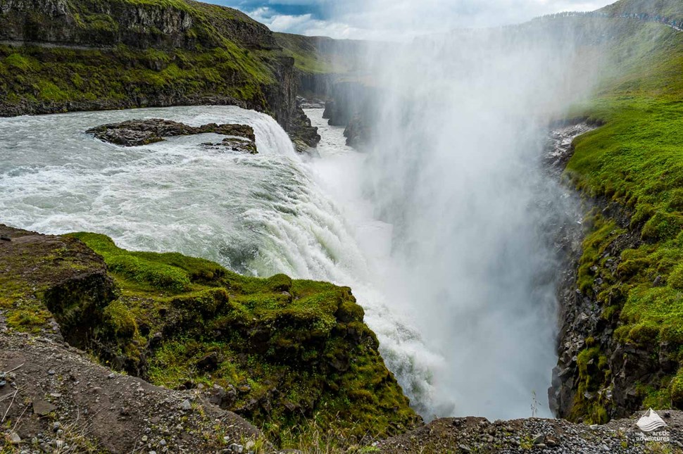 steams over crevasse of Gullfoss Waterfall