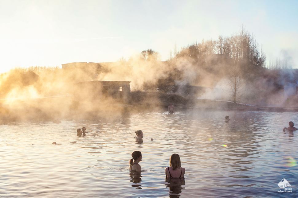 people bathe in Hot Spring pool of Iceland