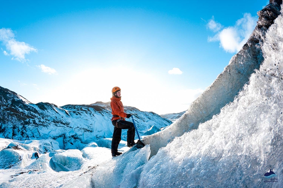 woman hiking on Solheimajokull Glacier
