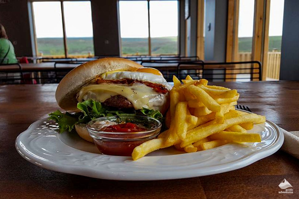 Egg burger with fried potatoes