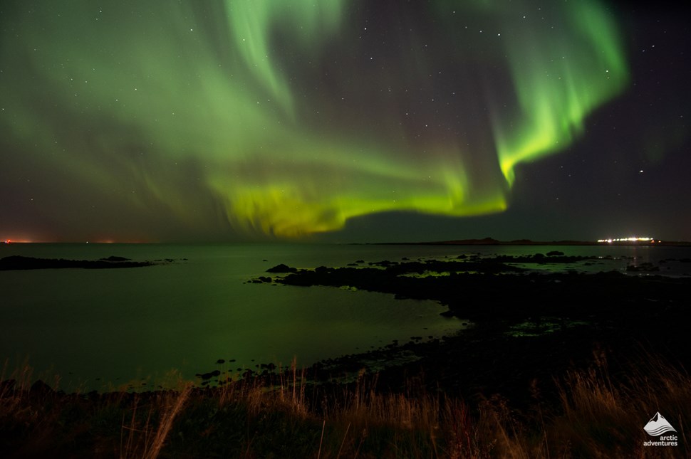 Northern Aurora above Egilsstadir city