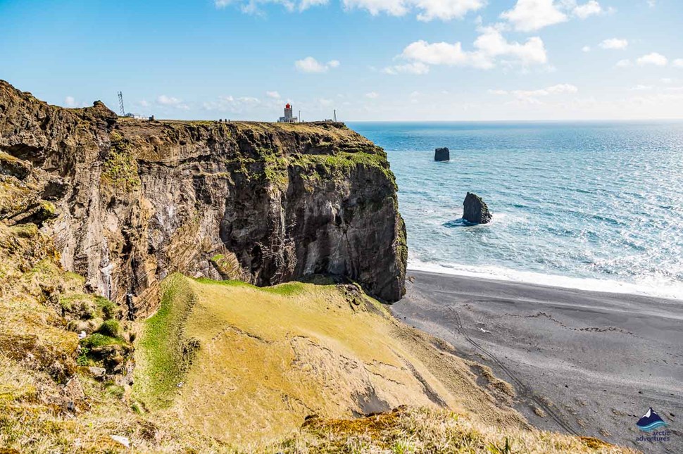 Lighthouse behind Dyrholaey cape in Iceland