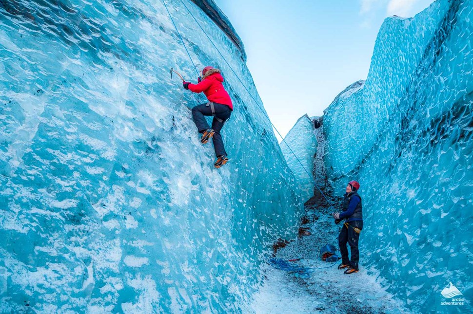 People climbing on Solheimajokull glacier