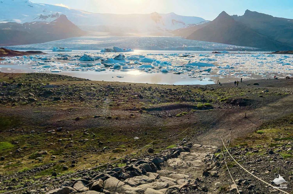 sun shining over Fjallsjokull Glacier Lagoon