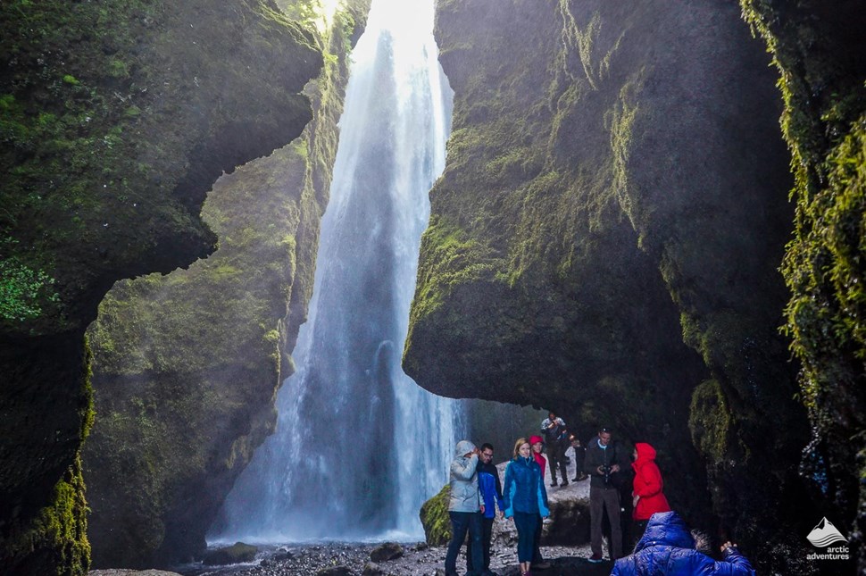 Tourists near Glujfrabui Waterfall in Iceland