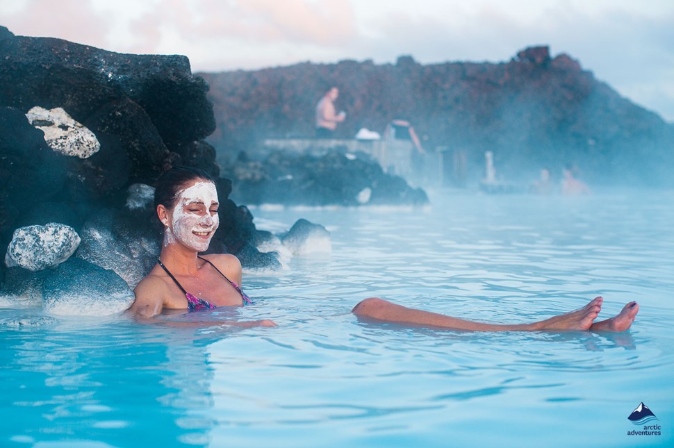  Woman applied a silica mud mask in Blue lagoon