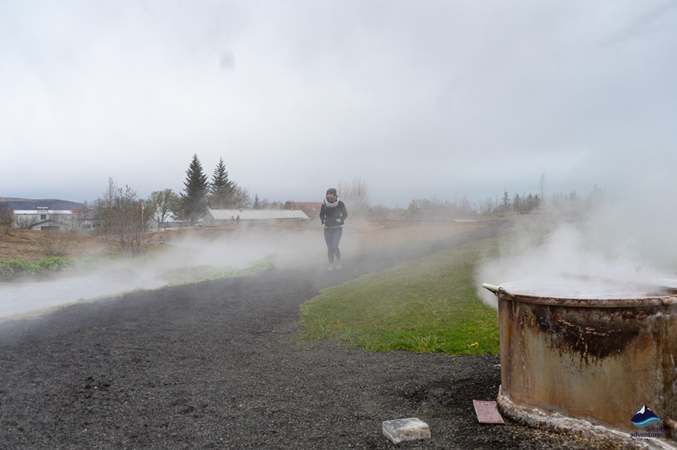 woman walking at Geothermal Park in Hveragerdi