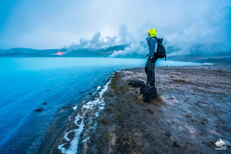 man standing near Myvatn lake in Iceland