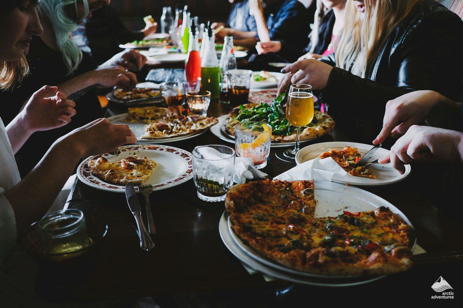 people eating at Pizza Place in Reykjavik