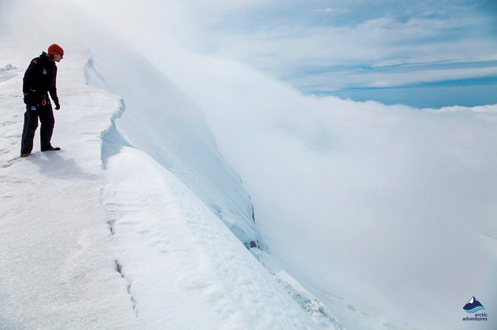 Man standing on edge of Snaefellsjokull Glacier