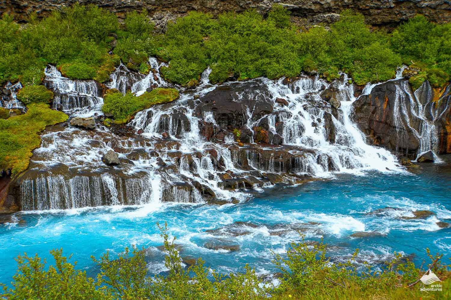 Barnafoss Waterfall and blue water in Iceland