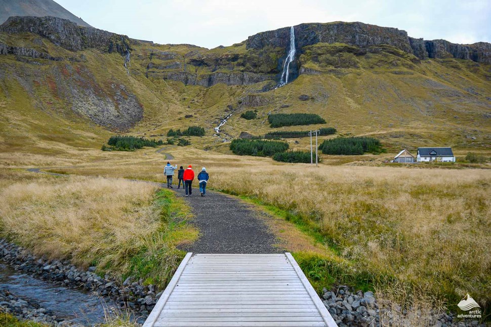 Wooden path to Bjarnarfoss Waterfall