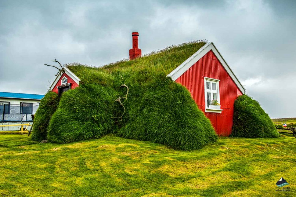 grass roofed red house in Iceland