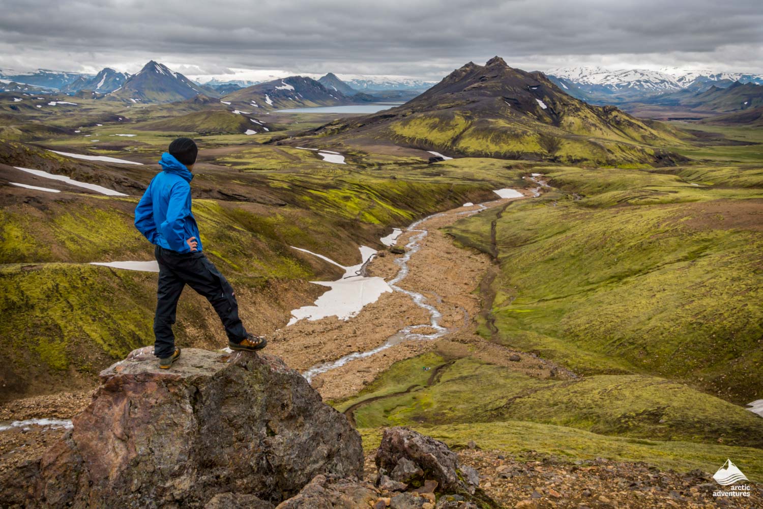 Man standing on rock near Laugavegur trek