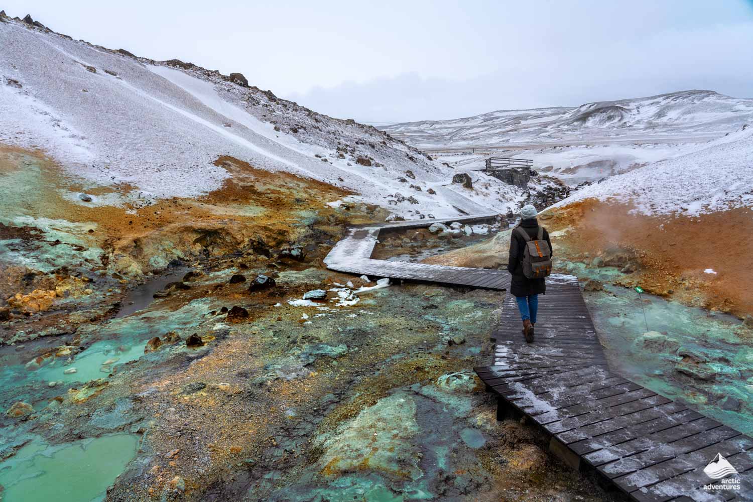 woman walking at Krysuvik in winter