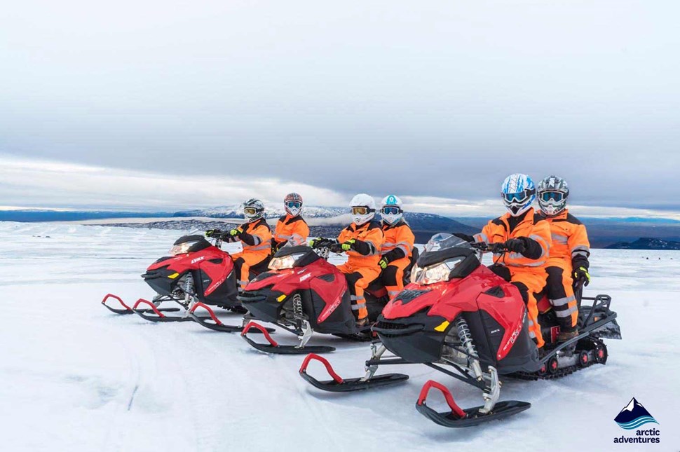 Langjokull Glacier Snowmobiling Activity Group Of People Iceland