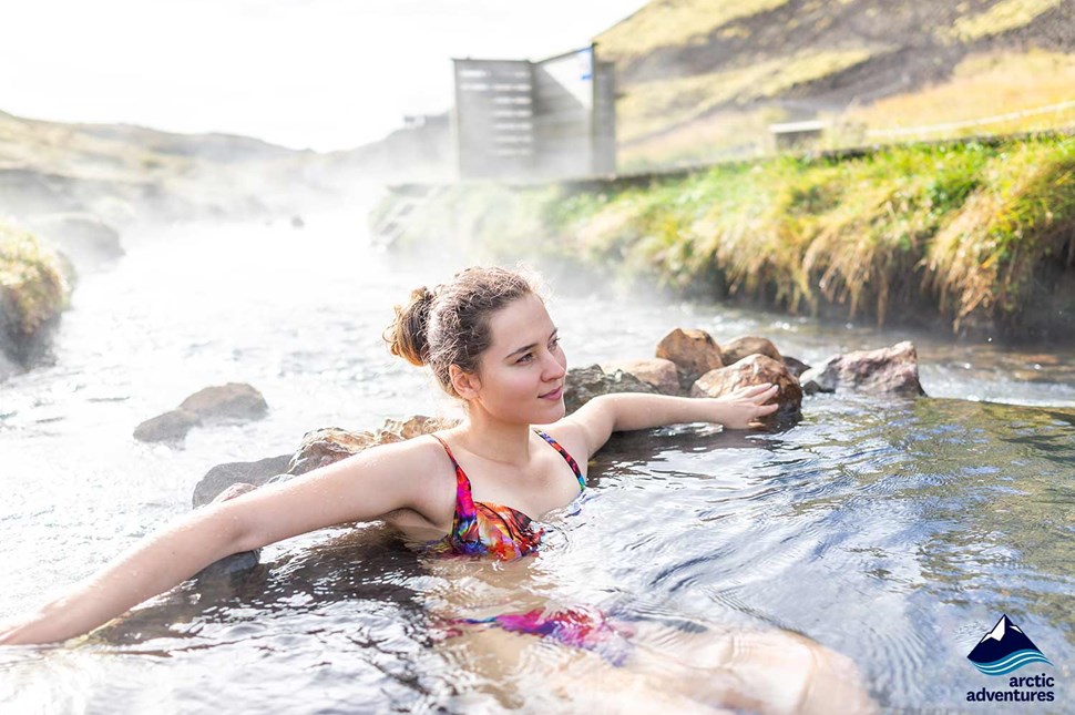 Happy Woman Bathing in Hveragerdi Geothermal River