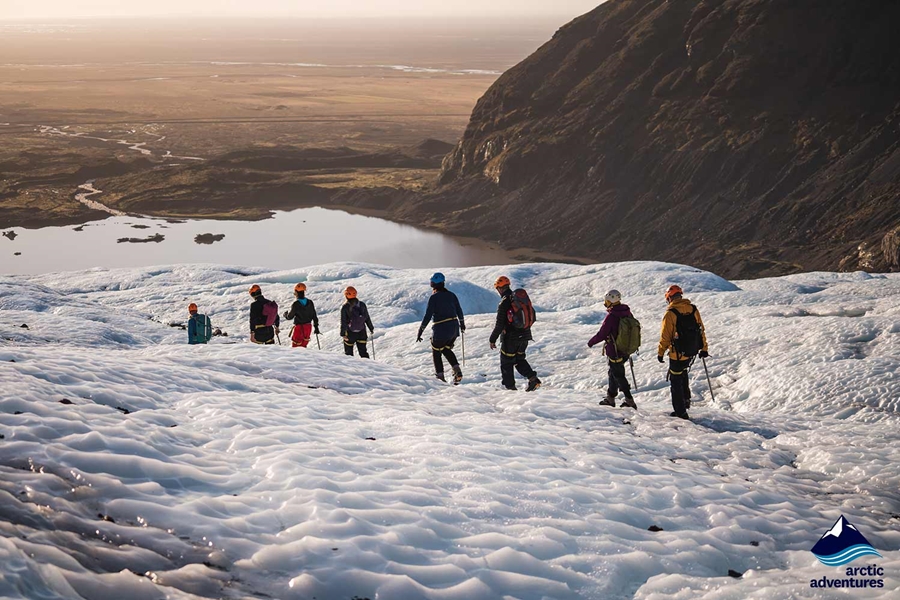 hikers going down Falljokull Glacier