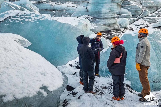 glacier hiking guide instructs explorers